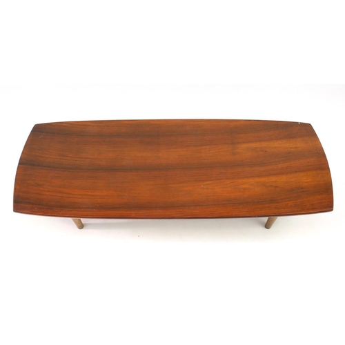 2062 - Vintage rosewood coffee table, shaped rectangular top on tapering turned legs, 31cm high x 128cm wid... 