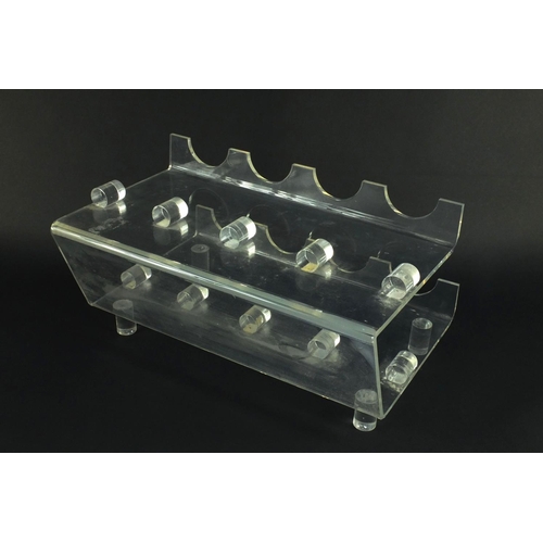 2274 - Modernist bent Perspex wine rack, 23cm high