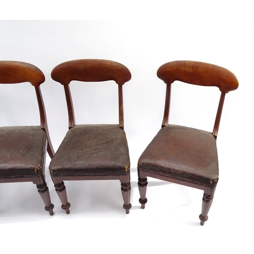 32 - Set of four Victorian mahogany dining chairs with brown leather seats