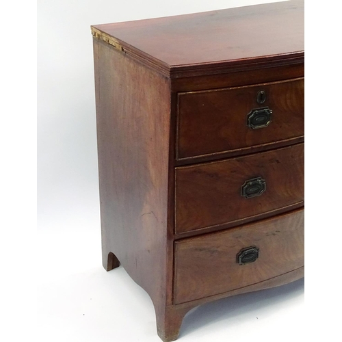 2 - Regency mahogany bow front four drawer chest of small proportions, fitted with two short above two l... 
