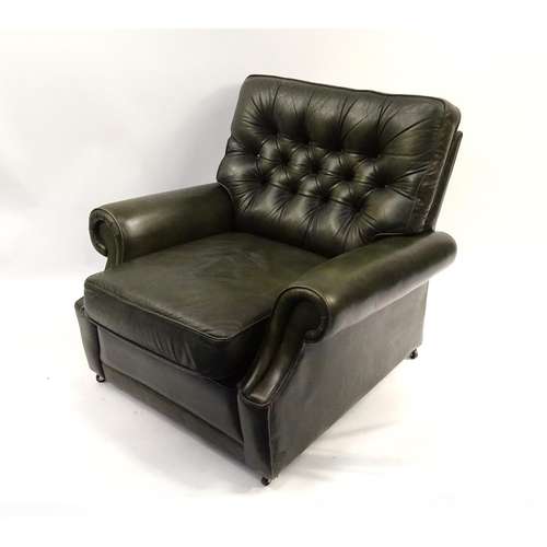 26 - Green leather easy chair with button back upholstery