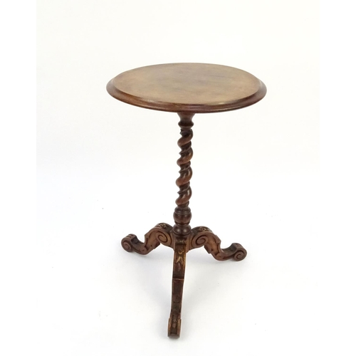 5 - Carved walnut tripod occasional table with barley twist column, 64cm high x 39cm in diameter
