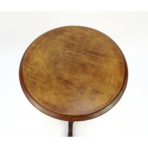 5 - Carved walnut tripod occasional table with barley twist column, 64cm high x 39cm in diameter
