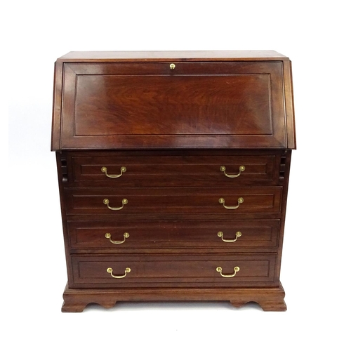16 - Hardwood bureau with pull down front, fitted interior and four drawers, 101cm high x 41cm wide x 97c... 