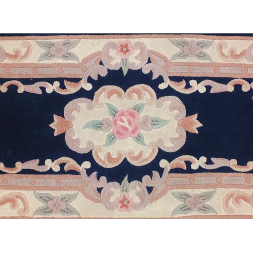 35A - Small blue ground floral rug, 150cm x 76cm