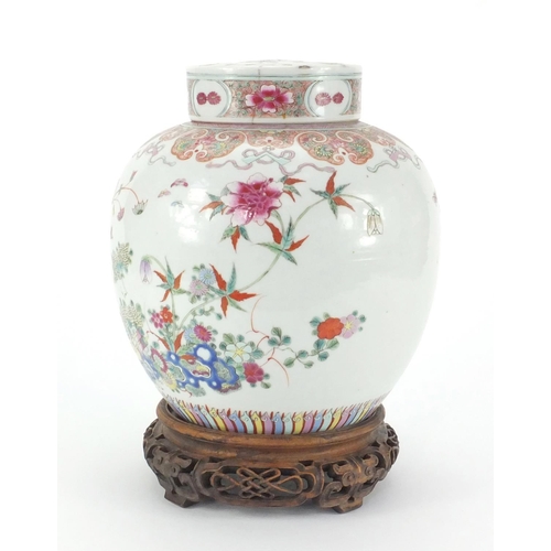 457 - Chinese porcelain ginger jar and cover on carved rosewood stand, the jar finely hand painted in the ... 