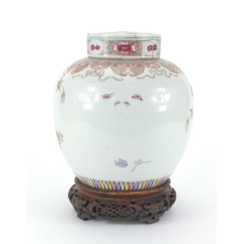 457 - Chinese porcelain ginger jar and cover on carved rosewood stand, the jar finely hand painted in the ... 