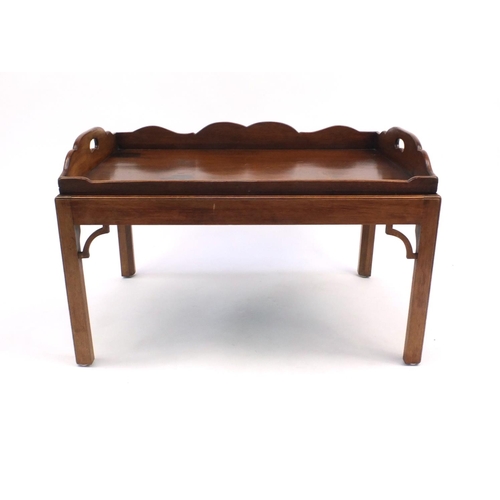 31 - Mahogany butlers tray table, 48cm high x 75cm wide x 50cm deep