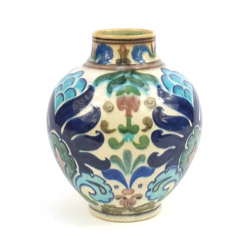 727 - Burmantofts pottery vase of Persian influence by Leonard King, hand painted with stylised flowers an... 