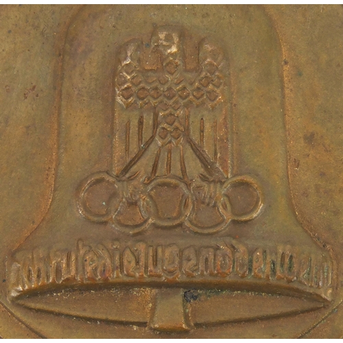 142 - 1936 Berlin Olympics participation medal, 7cm in diameter, approximate weight 121.0g