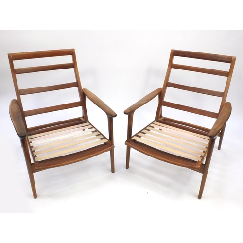2052 - Pair of 1970's Danish teak elbow chairs with floral upholstered lift off cushions, each 96cm high