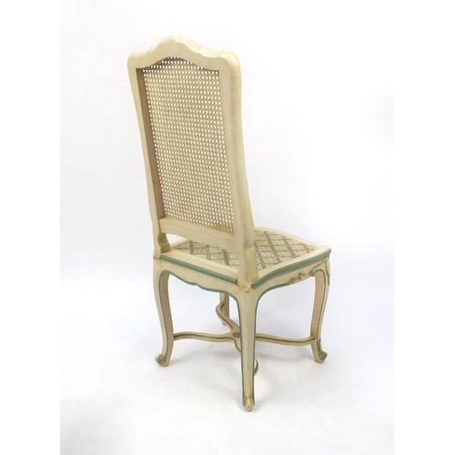 18 - Set of six cream and green painted highback dining chairs with cane panelled backs and seats to incl... 
