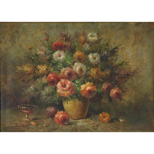 47 - Oil onto canvas, still life flowers in a vase, bearing a signature H Cachard 1957, gilt framed, 78cm... 