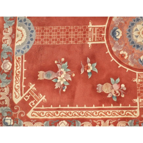 19 - Chinese salmon ground floral carpet, 280cm x 185cm