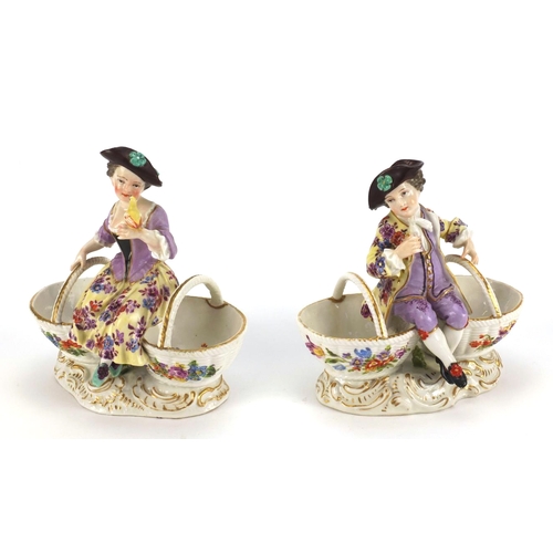 660 - 19th century pair of continental porcelain figural double baskets, both hand painted with flowers, b... 