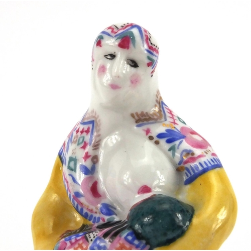 670 - Russian porcelain figure of mother and child, hand painted, marked inside, 14cm high