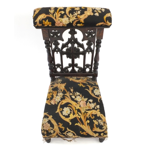 36 - Victorian prayer chair with carved back and needle point upholstery, 92cm high