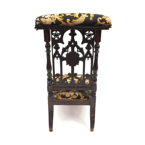 36 - Victorian prayer chair with carved back and needle point upholstery, 92cm high