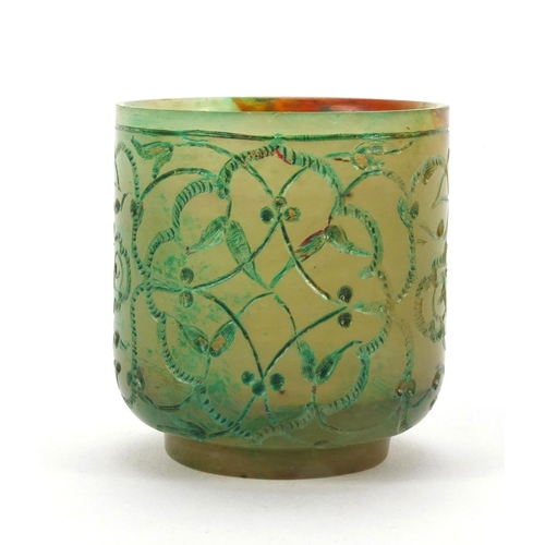 634 - Islamic green jade cup decorated with floral motifs, 5.2cm high