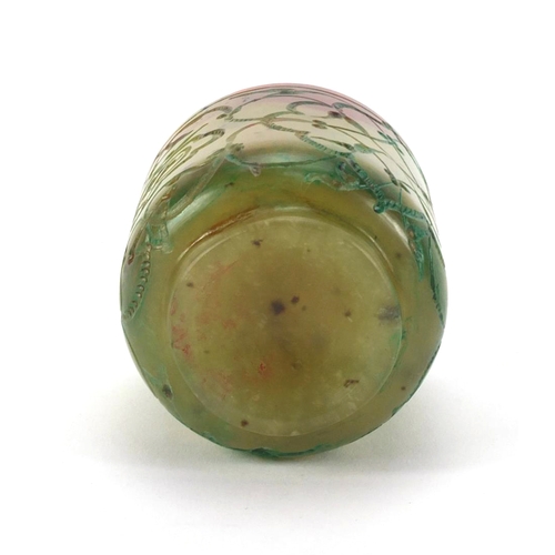 634 - Islamic green jade cup decorated with floral motifs, 5.2cm high