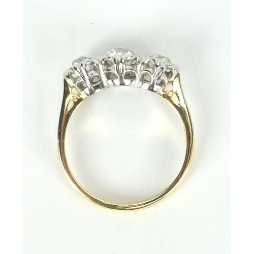 913 - 18ct gold diamond three stone ring, size H, approximate weight 2.8g