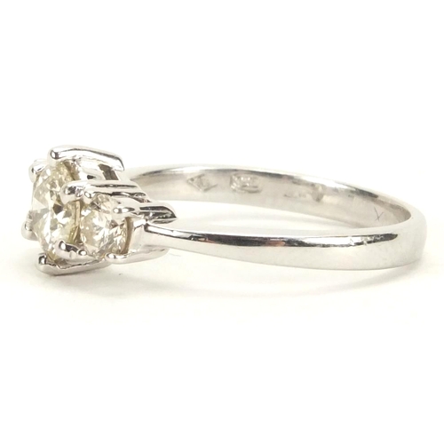 935 - 18ct white gold three stone diamond ring, size N, approximate weight 3.8g