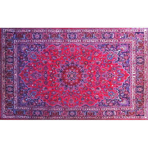 43 - Red and blue ground carpet with floral border and motifs, approximately 400cm x 300cm