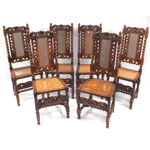 17 - Set of six oak barley twist high back dining chairs with cane back and seats, each 116cm high