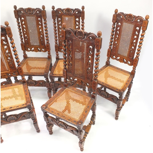 17 - Set of six oak barley twist high back dining chairs with cane back and seats, each 116cm high