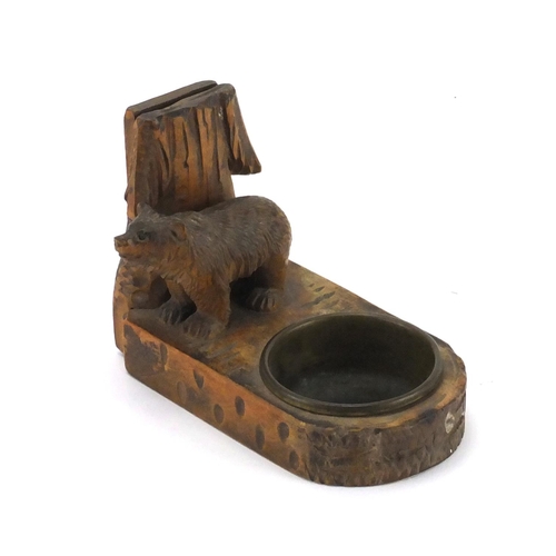 329 - Carved black forest bear ashtray, 11.5cm in length