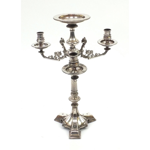 105 - Silver plated centre piece with three rams head candlestick branches, 51cm high