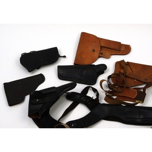 640 - Mixed Military interest pistol holsters including Walther examples