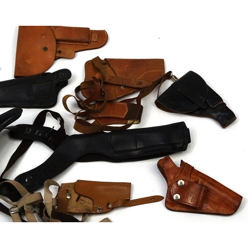 640 - Mixed Military interest pistol holsters including Walther examples