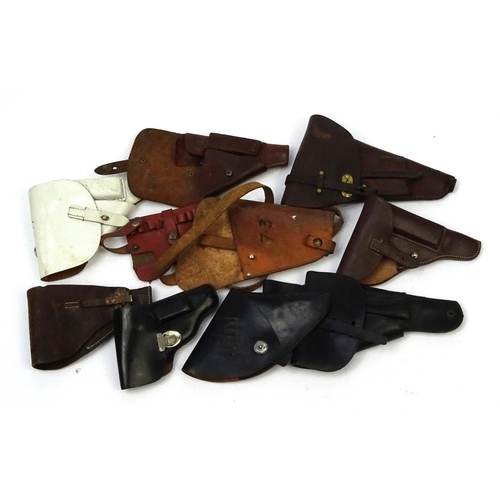 638 - Mixed leather pistol holsters including a Watlher example