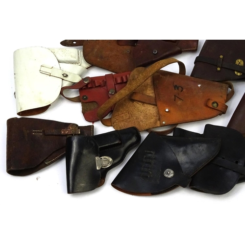 638 - Mixed leather pistol holsters including a Watlher example