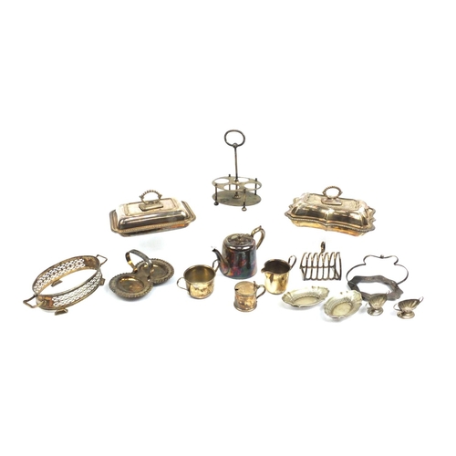 219 - Silver plated items including two entrée dishes and a cruet stand, including Mappin & Webb examples