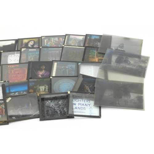 338 - Coloured and black and white glass slides predominantly religious examples