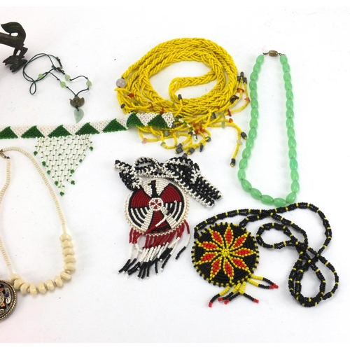 262 - African and Oriental necklaces and items including beadwork examples