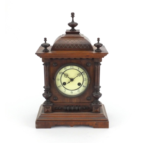 107 - Edwardian walnut striking mantle clock, 42cm high