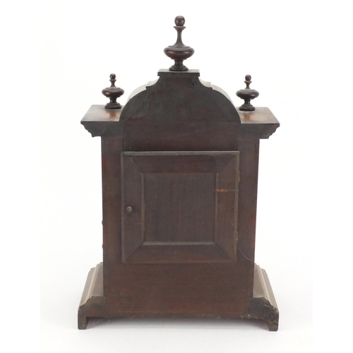 107 - Edwardian walnut striking mantle clock, 42cm high