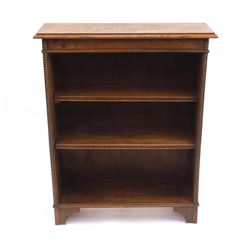 42 - Oak open book case fitted with two adjustable shelves, 97cm H x 78cm W x 25cm D