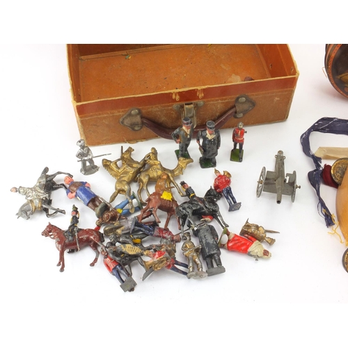 439 - Group of vintage lead hand painted soldiers, cowboys and Indians etc, together with a tambourine and... 