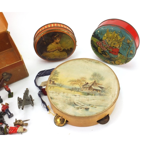 439 - Group of vintage lead hand painted soldiers, cowboys and Indians etc, together with a tambourine and... 