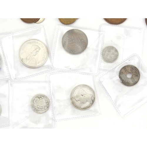 294 - Bag of assorted World coins including silver examples