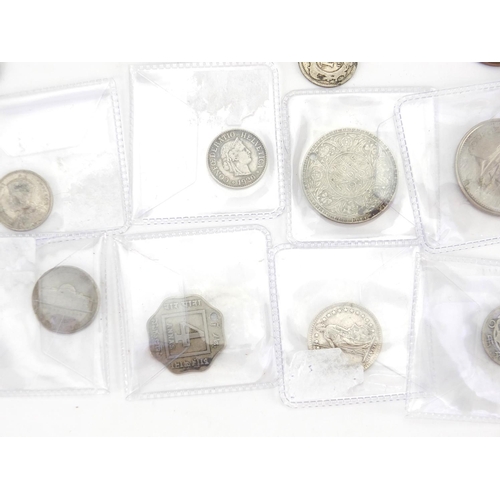 294 - Bag of assorted World coins including silver examples