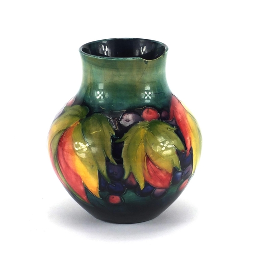 2106 - Moorcroft leaf and berry pattern vase, factory marks to the base, 13.5cm high