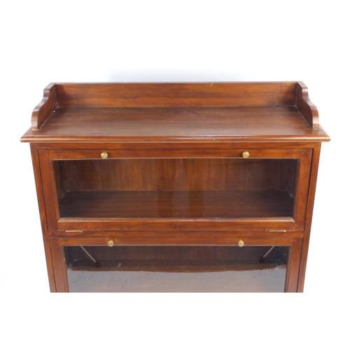 3 - Walnut glazed three section book case fitted with two drawers to the base, 159cm H x 108cm W x 35cm ... 