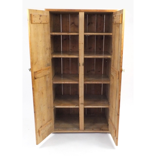 102 - Rustic pine two door hall cupboard enclosing four shelves, 169cm H x 89cm W x 53cm D