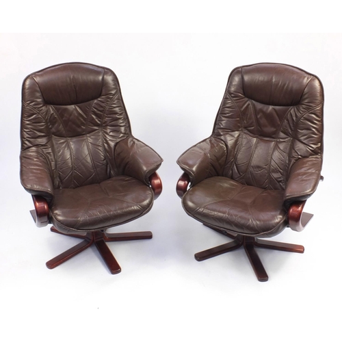 29 - Pair of brown leather stressless style reclining arm chairs, 103cm H