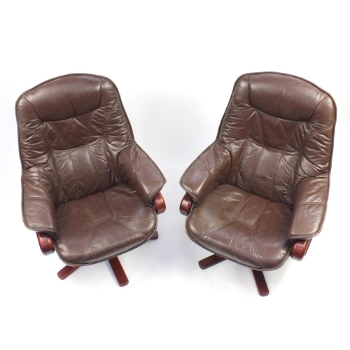 29 - Pair of brown leather stressless style reclining arm chairs, 103cm H